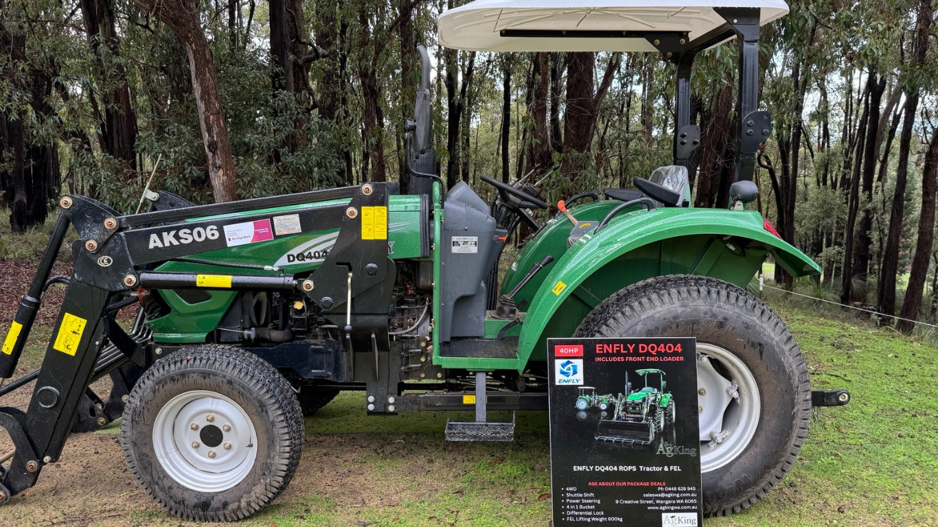 Enfly DQ404 tractor on display in bush setting 