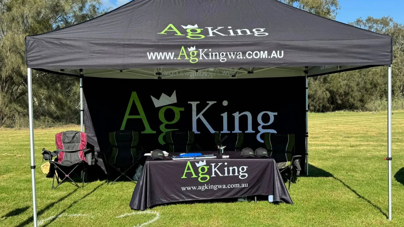 AgKing Stand May 2026-opt AgKing branded mini marque at an outdoor tractor show in Western Australia