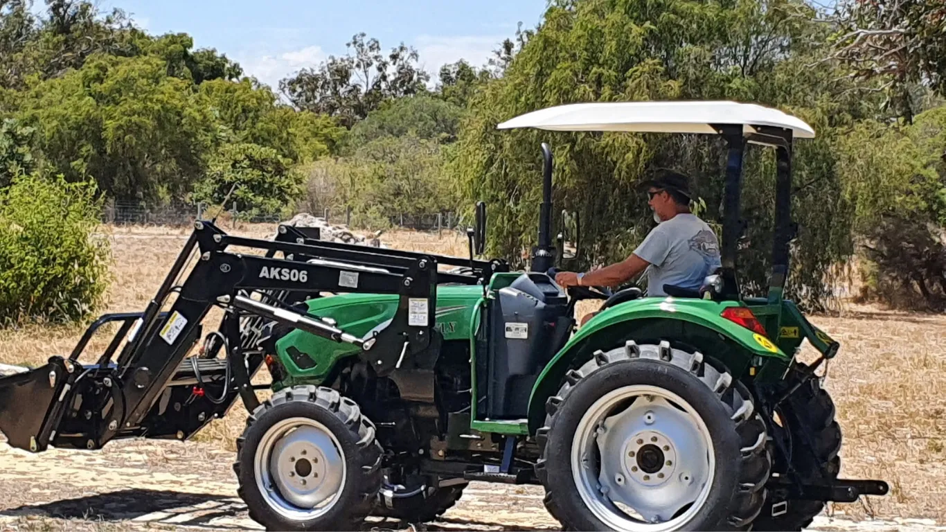 Tractor with rollover protection operating in a paddock in Western Australia
