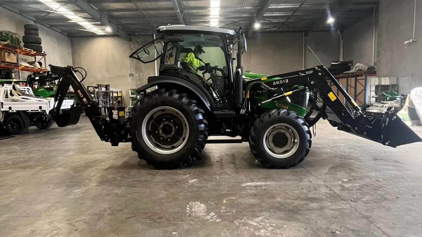 Mechanic servicing a tractor at AgKing WA's Wangara workshop
